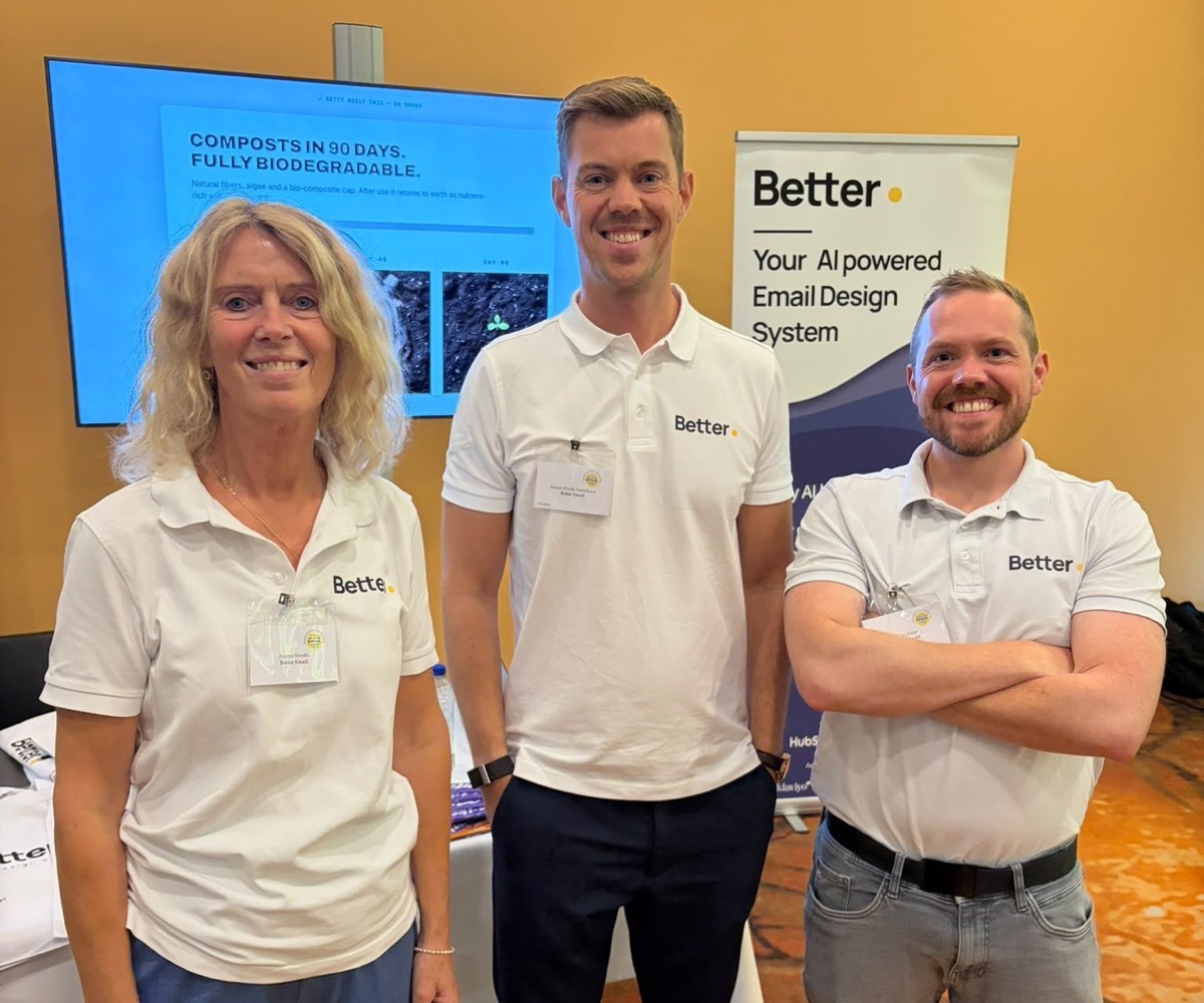 Anette Westh, Simon Westh Henriksen and Nicki Pabst in Better Email shirts at the booth, with a campaign Betty built on the screen behind them